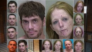 Couple found ‘passed out’ by a dumpster ‘with a bag of syringes,’ tin foil and a white substance, cops say